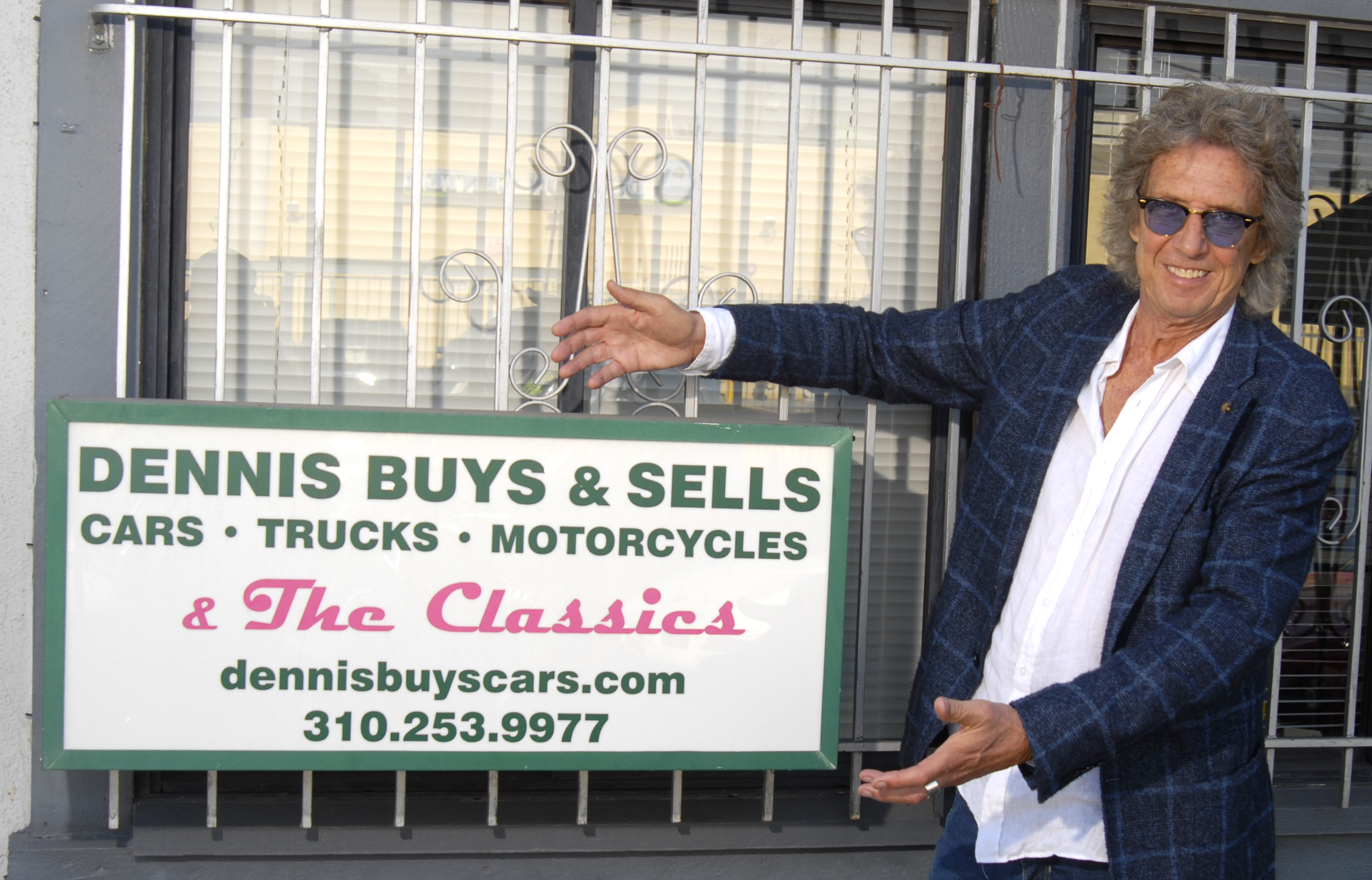 Dennis and sign
